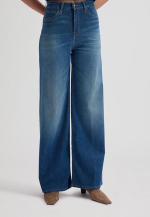 STELLA - Bootcut jeans - blue arrow