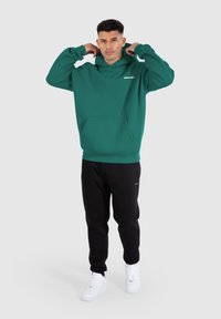 Smilodox Jersey con capucha - dunkelgrün