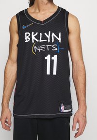 Black basketball jersey featuring "BKLYN NETS" in white and blue text, number 11 in white, herringbone texture, and multicolored accents.