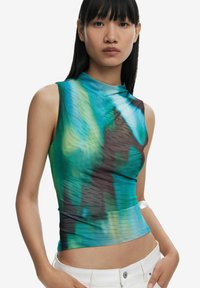 Sleeveless top in a blend of teal, green, and brown shades. Smooth fabric with a high neckline and a form-fitting design.