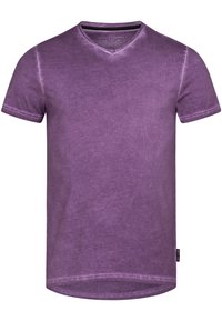 V-neck short-sleeve T-shirt in solid purple, featuring a soft texture and subtle fading effect, with a logo tag on the left side.