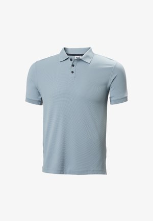 Light blue short-sleeve polo shirt with three black buttons and a folded collar, displayed on a white background.