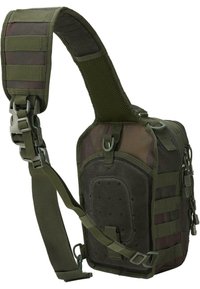 Olive green tactical sling bag with textured exterior, adjustable padded strap, multiple compartments, and webbing for attachment.