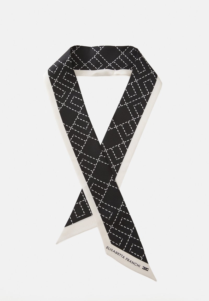 Black silk scarf featuring a geometric white stitched pattern and a cream-colored border. Signature label in the corner.