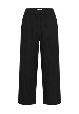 Pantalons larges en lin noir avec une taille élastique et des poignets retroussés, présentant une texture lisse et une coupe ample et décontractée.