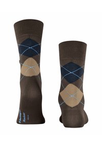 Brune argyle sokker med et diamantmønster i mørkeblå og beige, accented med lyseblå syninger, lavet af et fleksibelt strikkemateriale.