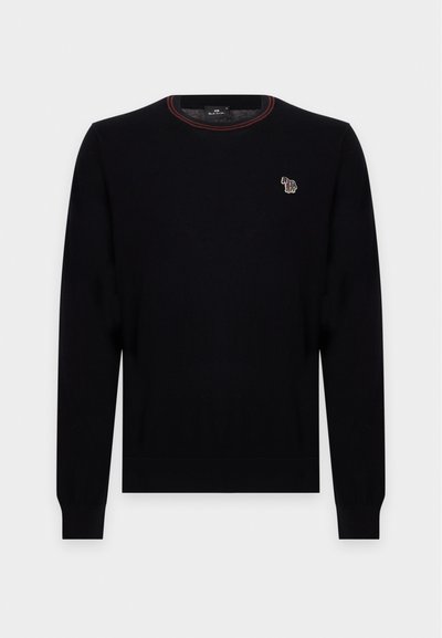 Pull noir manches longues col rond avec poignets et ourlet côtelés, présentant un petit logo zèbre multicolore sur la poitrine et une couture rouge sur l'encolure.
