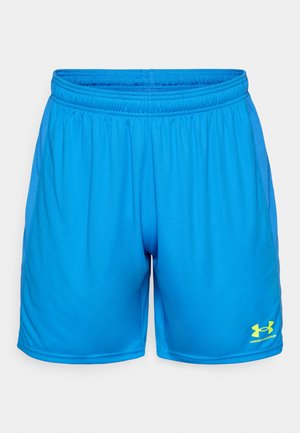 Modre atletske kratke hlače iz lahkega materiala, s fleksibilnim pasom in mrežnimi stranskimi paneli. Opazen rumen logotip Under Armour.