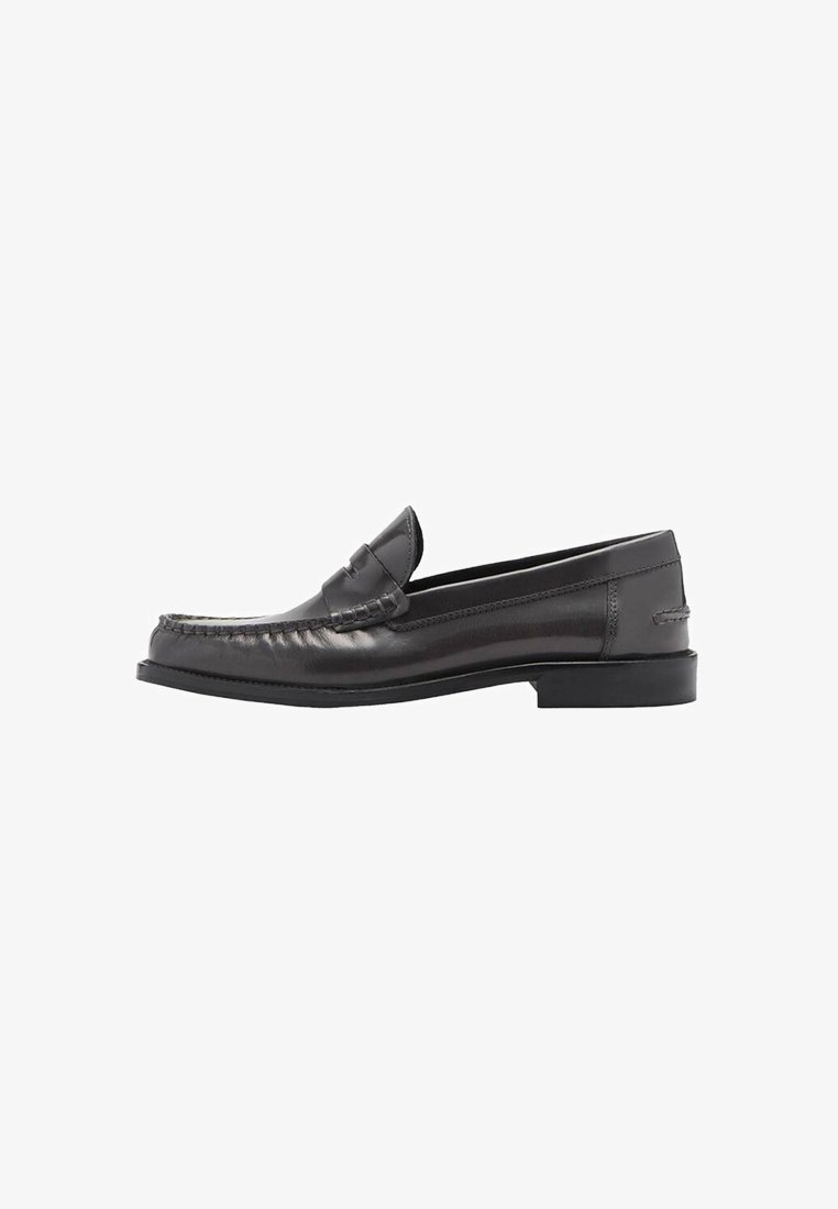 Black leather loafer with a smooth finish, rounded toe, decorative stitching, low heel, and a sleek silhouette.