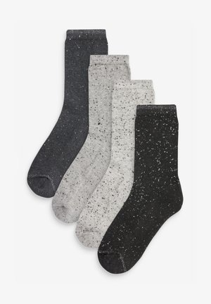 Set di quattro paia di calze a coste in grigio scuro, grigio chiaro e nero, con un motivo marmorizzato. Materiale morbido con una forma standard di calza.