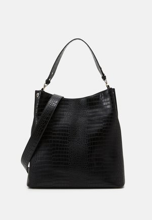 Sac à main noir avec texture crocodile, avec deux anses : une courte et une longue bandoulière, présenté sur fond blanc.