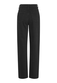 Crne, visoko strukirane traperice s opuštenim krojem. Imaju dvije stražnje džepove i ravne nogavice. Izrađene su od traper materijala.