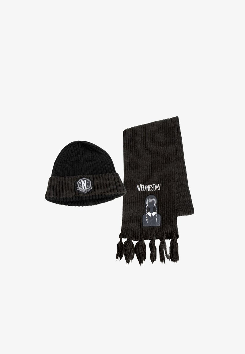 Black knitted beanie with a logo patch and matching scarf featuring a character graphic, fringed ends, and "WEDNESDAY" embroidered text.