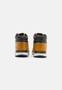 Kappa MONSI MID - Túracipők - yellow tan/black