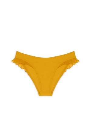 Yellow bikini briefs featuring a soft texture, a low-rise design, and ruffled accents along the edges. Smooth finish with minimal seams.