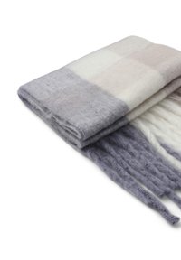 Coperte di lana con un motivo a quadri in tonalità di grigio, beige e bianco, bordato da frange e con una finitura morbida e testurizzata.
