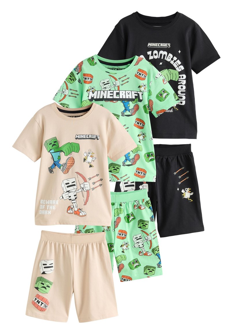 Quatre ensembles de pyjamas pour enfants sur le thème de Minecraft. Les couleurs incluent le noir, le vert et le beige, avec des motifs et des graphiques cartoon ludiques.
