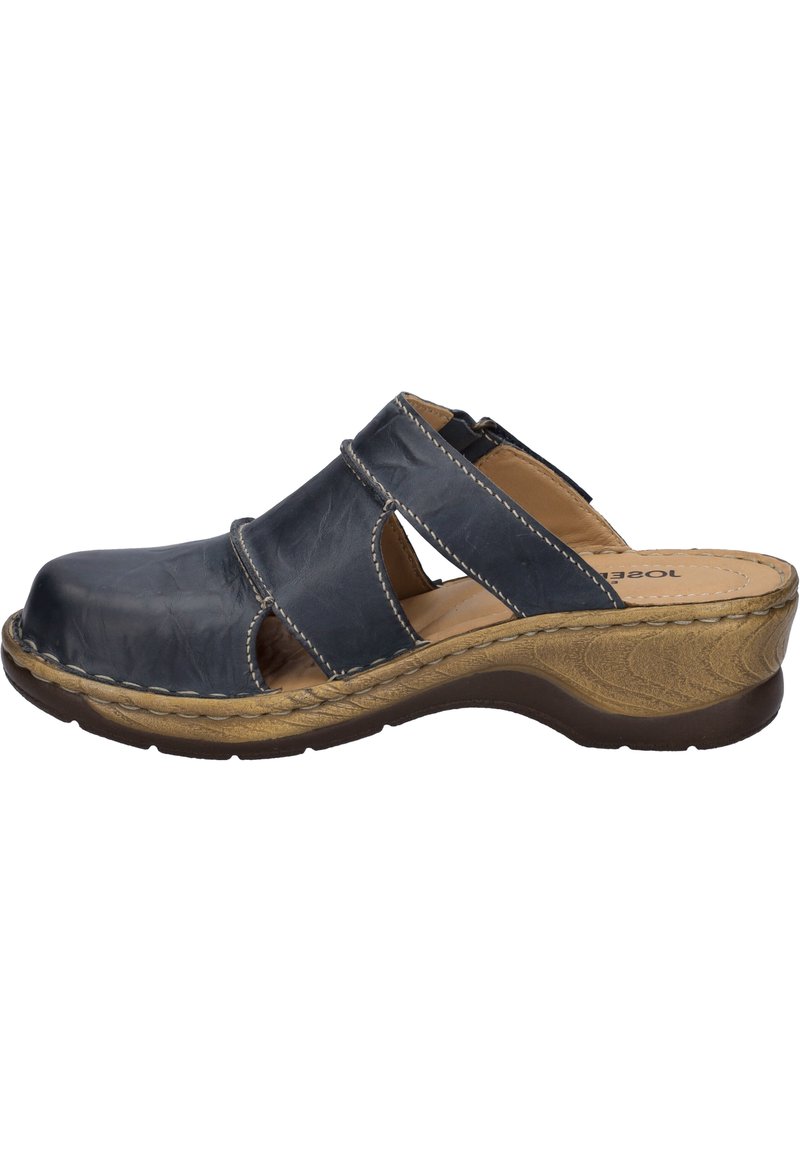 Navy leather sandal with two open straps and a closed toe. Features a textured brown wedge sole and light stitching accents.