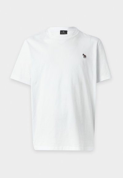 T-shirt blanc uni à manches courtes avec un petit logo zèbre multicolore sur le côté gauche de la poitrine et un col rond.