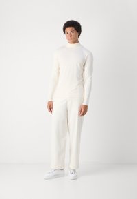 Tommy Hilfiger ROLL NECK TEE - Maglietta a manica lunga - ivory petal
