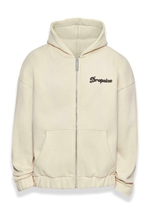 Zippered hoodie in cream fleece fabric. Features large front pockets, ribbed cuffs and hem, with "Dropsize" logo in dark brown on the chest.