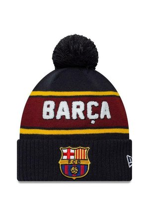 Knitted black pom-pom beanie with red and yellow stripes, white "BARÇA" text, and FC Barcelona crest on the cuff.