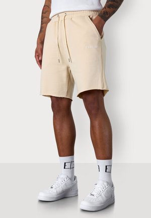 ESTEEM DISCREET - Tracksuit bottoms - cremebrulee
