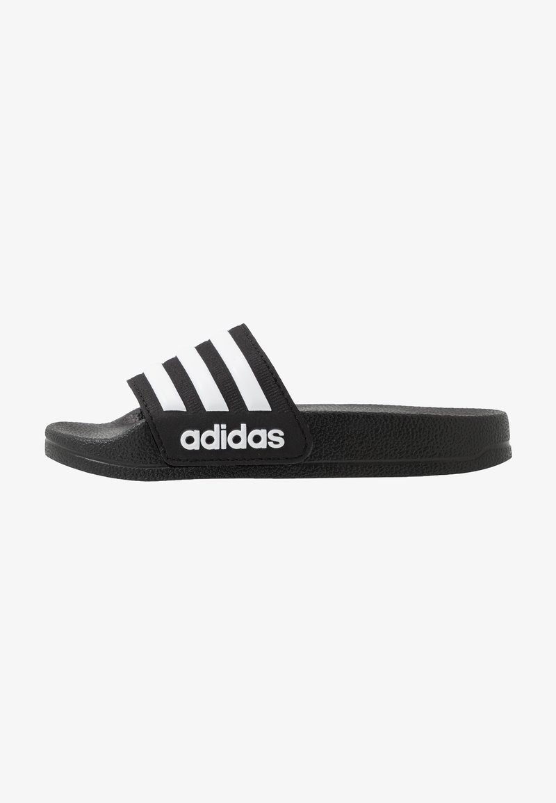 Black slide sandal with three white stripes and 'adidas' logo on the strap. Textured black rubber sole and smooth upper material.