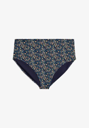 Højtaljede bikiniunderdele med navyblå bund og små blomsterprint i gul, grøn og hvid, vist fladt på en hvid baggrund.