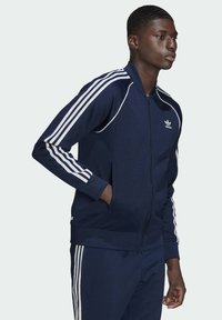 adidas Originals Športna jopa s kapuco na zadrgo - blue