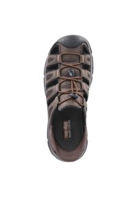 Brown slip-on shoe with mesh panels, rubber toe cap, and orange accents. Features elastic laces and a textured insole for grip.