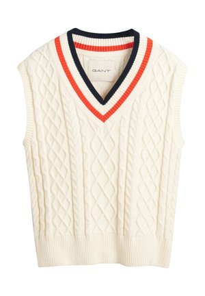 Gilet senza maniche in crema con un motivo a trecce. Presenta un colletto a V con strisce rosse e blu navy. Orlo a coste.