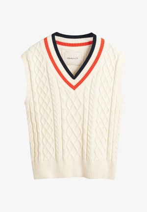 Gilet senza maniche in crema con un motivo a trecce. Presenta un colletto a V con strisce rosse e blu navy. Orlo a coste.