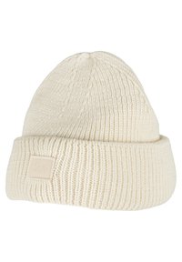 Beret tricotat crem cu o textură curbă, manșetă pliată și un eticheta pătrată pe care scrie "URBAN CLASSICS" pe partea din față.