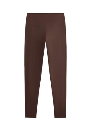 Brune leggings lavet af glat, elastisk materiale, med høj talje og tæt pasform, uden synlige mønstre eller detaljer.