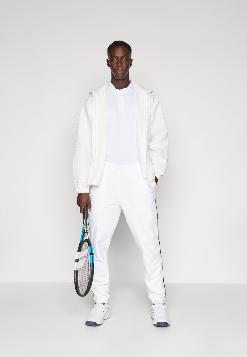 Lacoste Sport Trainingsbroek wit Lacoste Sport Trainingsbroek wit