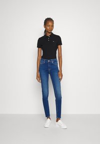 Tommy Jeans SLIM ESSENTIAL - Polo - black
