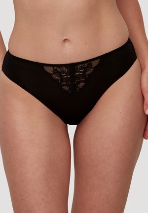 Slip di cotone nero con inserto in pizzo floreale sul davanti, vita media e superficie liscia in tutta la sua estensione.