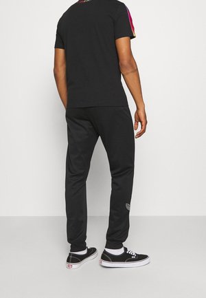 Pantalon de survêtement - black