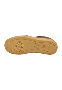 Brown shoe sole with a textured rubber bottom featuring circular and rectangular grip patterns and the brand name "LIU·JO" embossed.