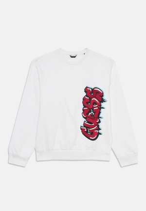 White sweatshirt with long sleeves and ribbed cuffs. Features textured red and blue graffiti-style logo on the front left side.