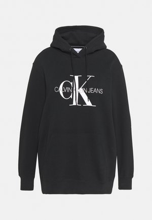 Sweat à capuche noir avec poche avant et logo blanc "CK Calvin Klein Jeans" imprimé sur la poitrine.