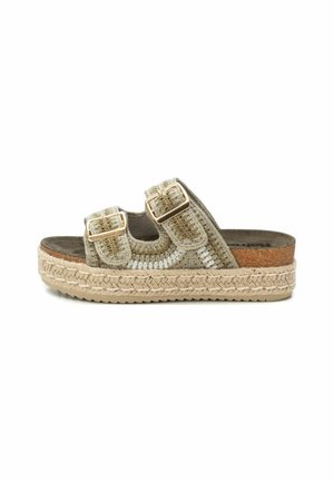 Sandalia deslizante de tela tejida en beige con dos hebillas ajustables, plantilla de corcho y suela de plataforma envuelta en yute. Superficie plana y texturizada.