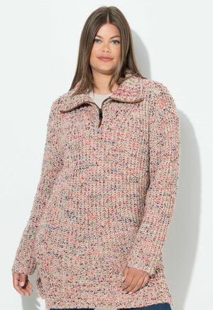 Pull en tricot beige avec des specks multicolores, col à demi-zip, manches longues et texture côtelée. Conception douce et oversize.