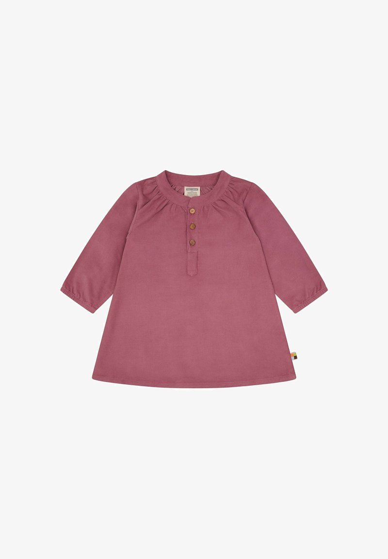Rosa Corddress mit langen Ärmeln, rundem Ausschnitt und drei Holzknöpfen vorne. Mit Raffungen am Ausschnitt.