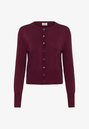 Burgundi, pika varrukaga kardigan, mis on valmistatud pehmest kootud kangast. Omab ümmargust kaelust, esipaneeli nuppe ning soonikuid varrukaotstes ja hemmi ääres.