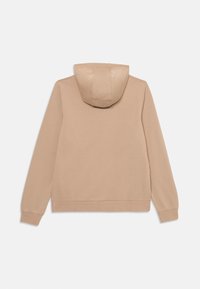 Sweatshirt beige à capuche avec des manches longues, des poignets et un ourlet côtelés, présenté de dos sur un fond blanc.