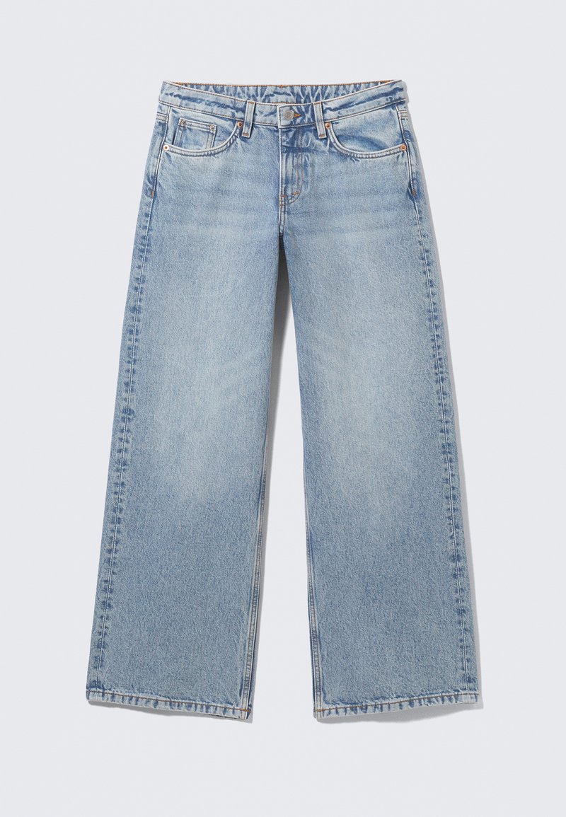 Hele sinised laiade säärtega teksad, valmistatud denimist, klassikalise viie tasku disainiga, nööpidega suletav ja minimaalse pleekimisega, et säilitada puhas välimus.