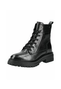 Botas de tobillo de cuero negro con punta redonda, cordones en la parte delantera, suela de goma gruesa y ojales de metal. Cuenta con una pestaña en la parte trasera.
