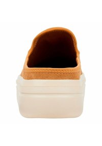 Orange suede slip-on shoe with a rounded toe, cream rubber sole, and stitched edges, showing a smooth texture and minimalist design.